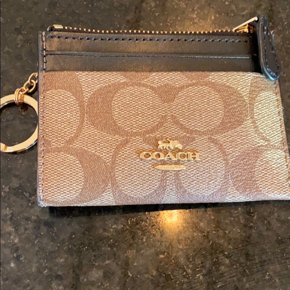 Coach credit card holder still in stores